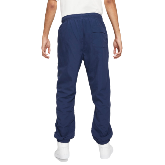 Штаны Nike SB Novelty Track Pant CW7715-410 (midnight navy-black)